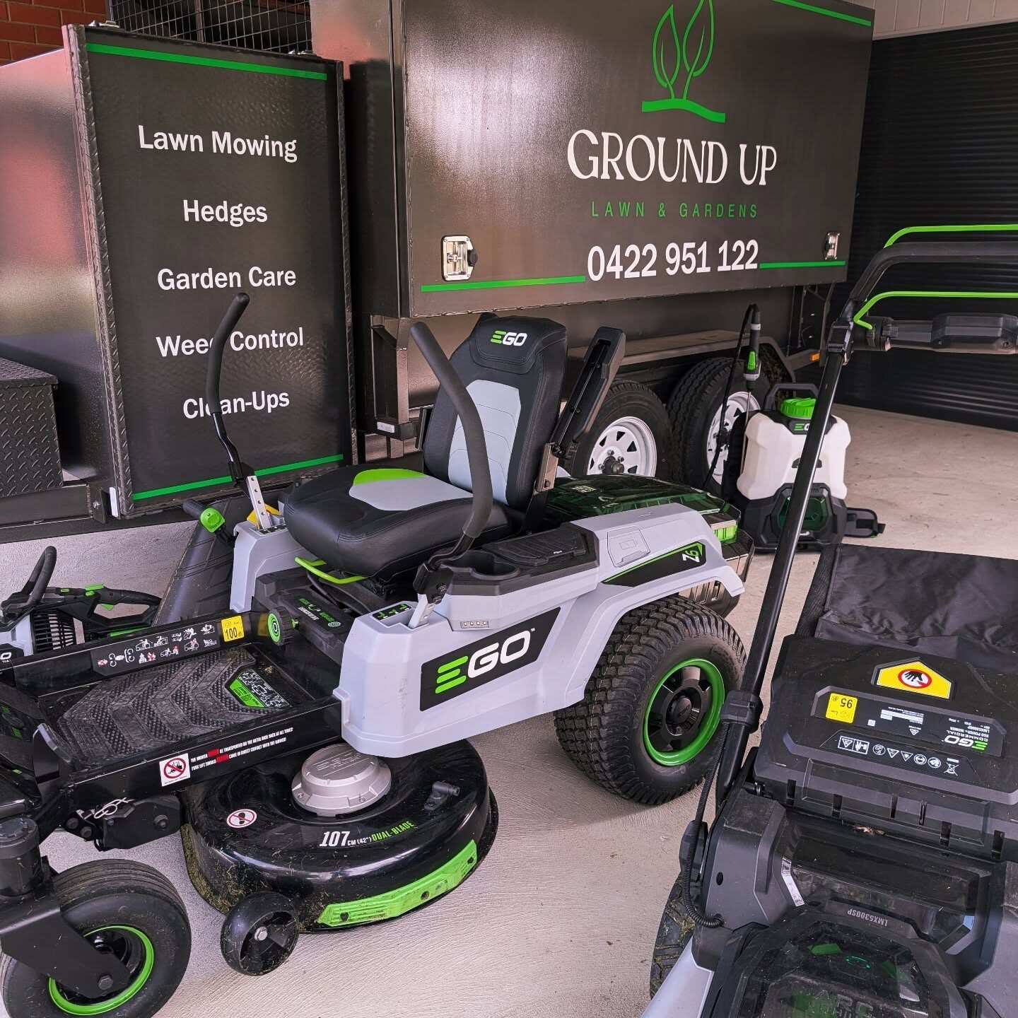 Ground Up Lawn & Gardens trailer and all-electric EGO mowing equipment